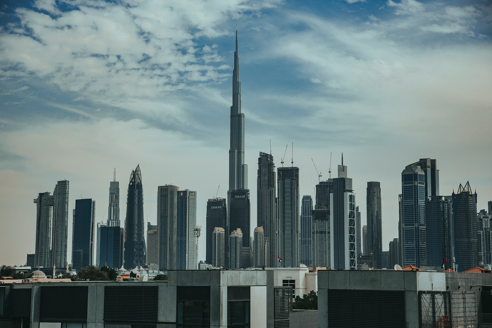 a very tall building with a very tall tower in the background